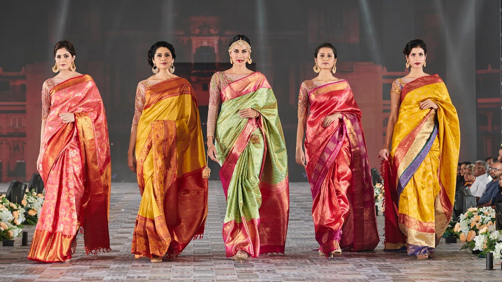 Indian artisan weaving on a loom